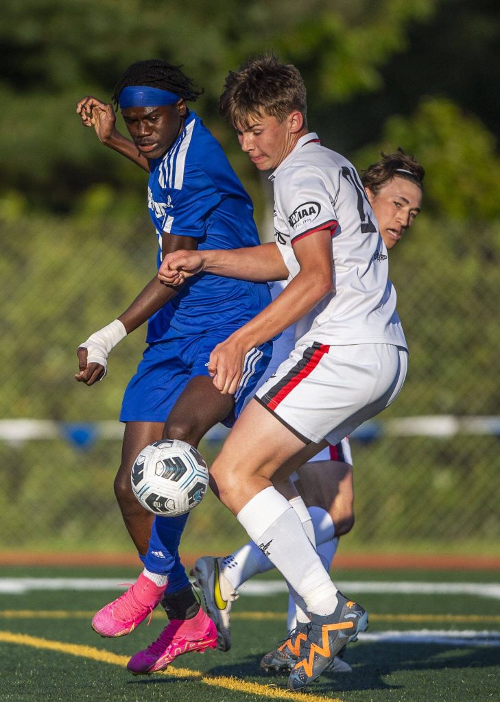 Shorewoods Anthony Henry battles for the ball during the game against Ballard on Thursday, May 18, 2023 in Shoreline, Washington. (Olivia Vanni / The Herald)