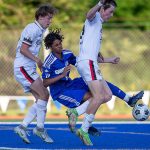 Shorewood’s Matthew Bereket is knocked down as he tries to get a shot off in the goal box during the game against Ballard on Thursday, May 18, 2023 in Shoreline, Washington. (Olivia Vanni / The Herald)