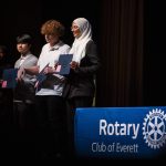 Naazneen Shafeer Vemmeerath-Kulangara smiles after receiving an AGB Scholarship at the Rotary Club of Everett Awards on Monday, May 22, 2023 in Everett, Washington. (Olivia Vanni / The Herald)