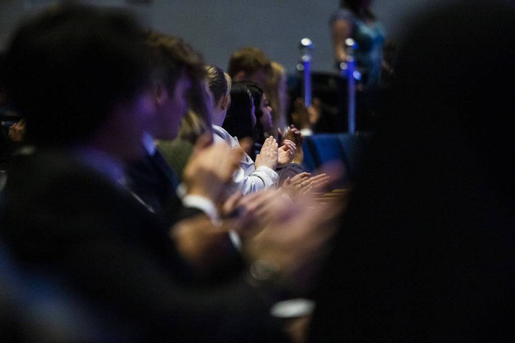 People clap for all the scholarship recipients at the end of the Rotary Club of Everett Awards on Monday, May 22, 2023 in Everett, Washington. (Olivia Vanni / The Herald)