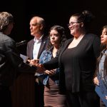 Morgan Gidney receives an AVID Scholarship during the Rotary Club of Everett Awards on Monday, May 22, 2023 in Everett, Washington. (Olivia Vanni / The Herald)