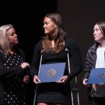 Jessica Finicle receives a Saunders Scholarship during the Rotary Club of Everett Awards on Monday, May 22, 2023 in Everett, Washington. (Olivia Vanni / The Herald)