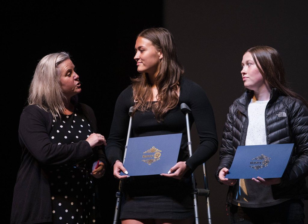 Jessica Finicle receives a Saunders Scholarship during the Rotary Club of Everett Awards on Monday, May 22, 2023 in Everett, Washington. (Olivia Vanni / The Herald)