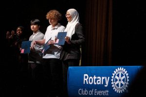 Naazneen Shafeer Vemmeerath-Kulangara smiles after receiving an AGB Scholarship at the Rotary Club of Everett Awards on Monday, May 22, 2023 in Everett, Washington. (Olivia Vanni / The Herald)