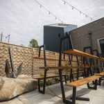 The outside patio of the Sound2Summit Craft Brewery in Everett Marina Village at the Port of Everett on Wednesday, May 24, 2023 in Everett, Washington. (Olivia Vanni / The Herald)