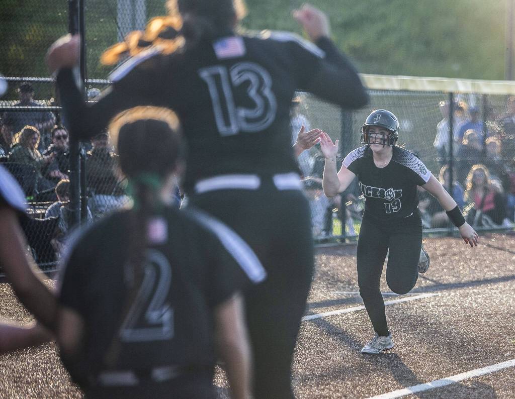 Jacksons Hailey Pelletier runs into home after hitting a homerun during the game against Bothell on Friday, May 19, 2023 in Everett, Washington. (Olivia Vanni / The Herald)