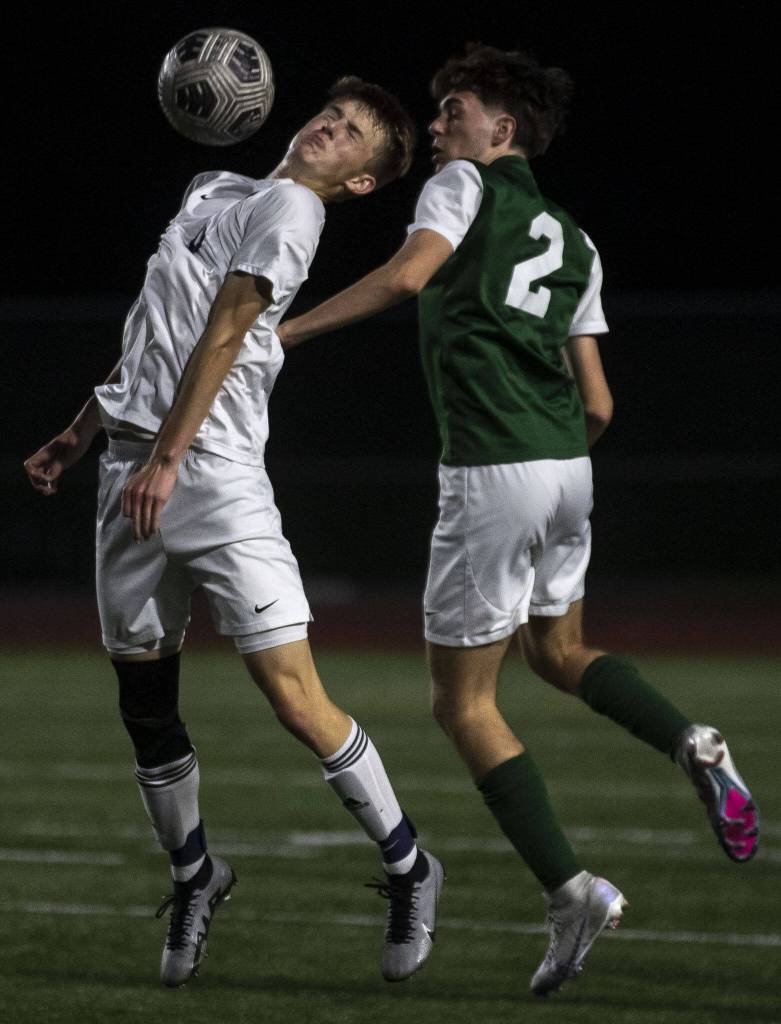 Meads Wes Starley (10) heads the ball during a game between Edmonds-Woodway and Mead at Edmonds-Wooday High School in Edmonds, Washington on Friday, May 19, 2023. Edmonds-Woodway won, 2-0. (Annie Barker / The Herald)