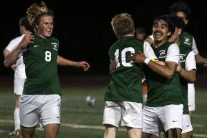 Edmonds-Woodway players celebrate during a game between Edmonds-Woodway and Mead at Edmonds-Wooday High School in Edmonds, Washington on Friday, May 19, 2023. Edmonds-Woodway won, 2-0. (Annie Barker / The Herald)
