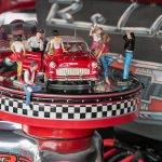 Figurines decorate an engine block of a Chevy Bel Air during Cruzin to Colby in Everett in 2022. (Kevin Clark / The Herald)