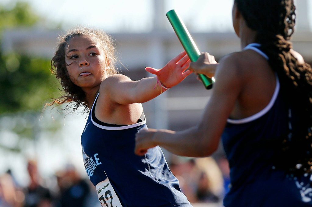 The Meadowdale girls run in the 3A 4x400 meter relay during the WIAA State Track and Field Championships on Saturday, May 27, 2023, at Mount Tahoma High School in Tacoma, Washington. (Ryan Berry / The Herald)