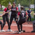 Snohomish players celebrate during a game between Snohomish and Walla Walla at the Lacey-Thurston County Regional Athletic Complex in Olympia, Washington on Saturday, May 27, 2023. Snohomish won, 7-3. (Annie Barker / The Herald)