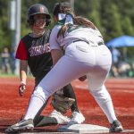 A Snohomish player slides safe into third during the 3A softball championship game between Snohomish and Peninsula at the Lacey-Thurston County Regional Athletic Complex in Olympia, Washington on Saturday, May 27, 2023. Snohomish lost, 4-1. (Annie Barker / The Herald)