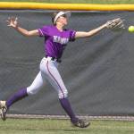 Kamiaks Tyler Karabach (11) reaches for a fly ball to center field in the sixth inning during a 4A state softball consolation game against Bothell on Saturday in Richland. (TJ Mullinax / For The Herald)