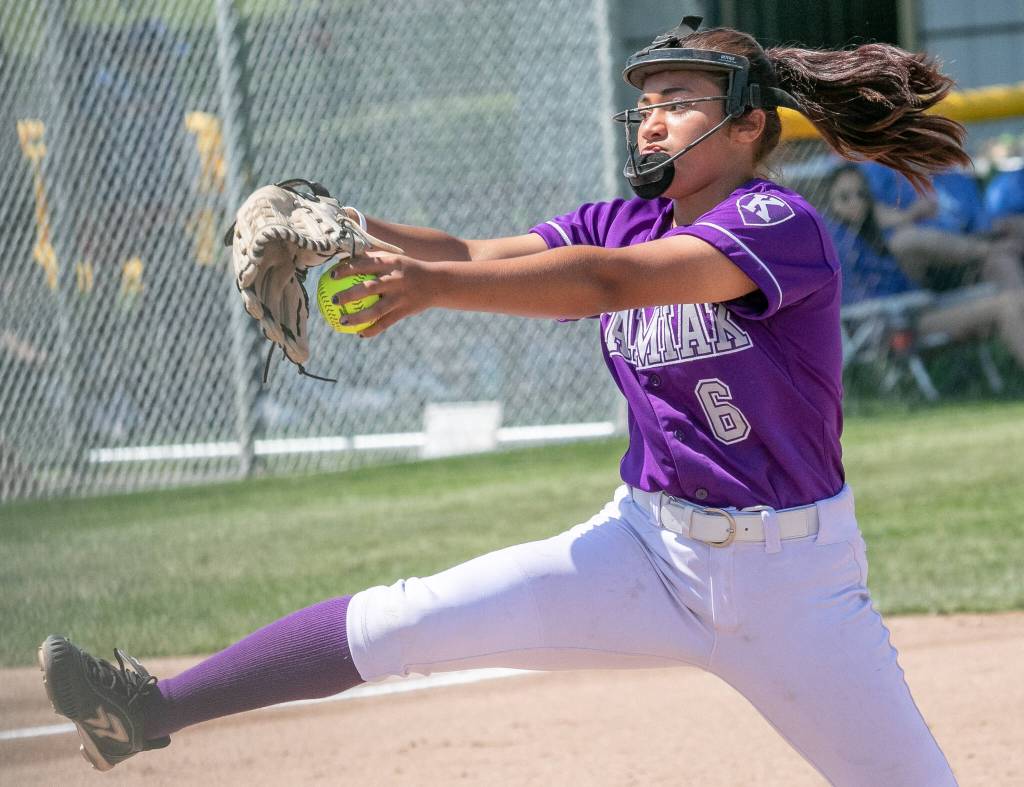 Kamiaks Synclair Mawudeku (6) pitches in the first inning during a 4A state softball consolation game against Bothell on Saturday in Richland. (TJ Mullinax / For The Herald)