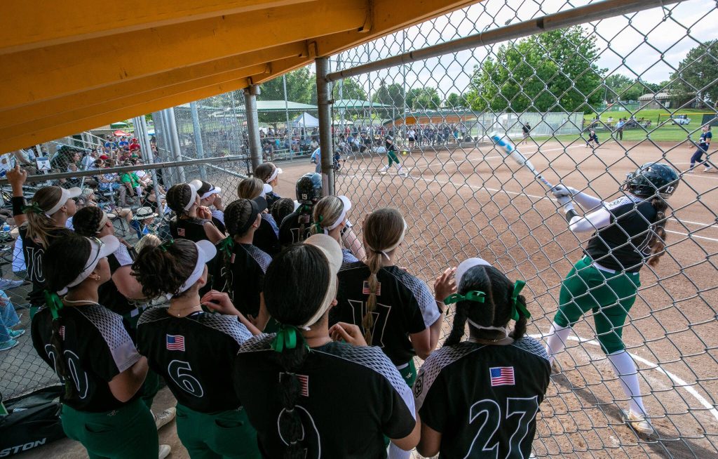 Jacksons Yanina Sherwood (13) takes a warmup swing during the WIAA Class 4A state softball title game on Saturday, May 27, 2023, in Richland. (TJ Mullinax / For The Herald)