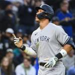 New York Yankees' Aaron Judge gestures after hitting a solo home-run against the Seattle Mariners during the seventh inning of a baseball game Tuesday, May 30, 2023, in Seattle. (AP Photo/Caean Couto)