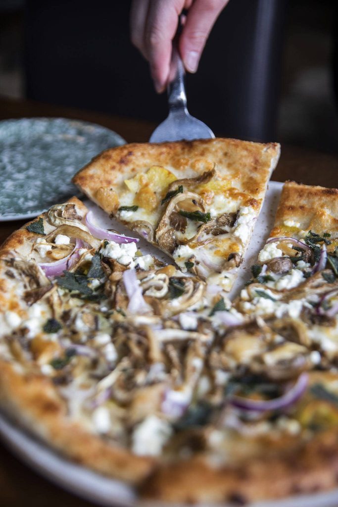 Fire and the Feasts potato and mushroom pizza on Tuesday, April 4, 2023 in Edmonds, Washington. (Olivia Vanni / The Herald)