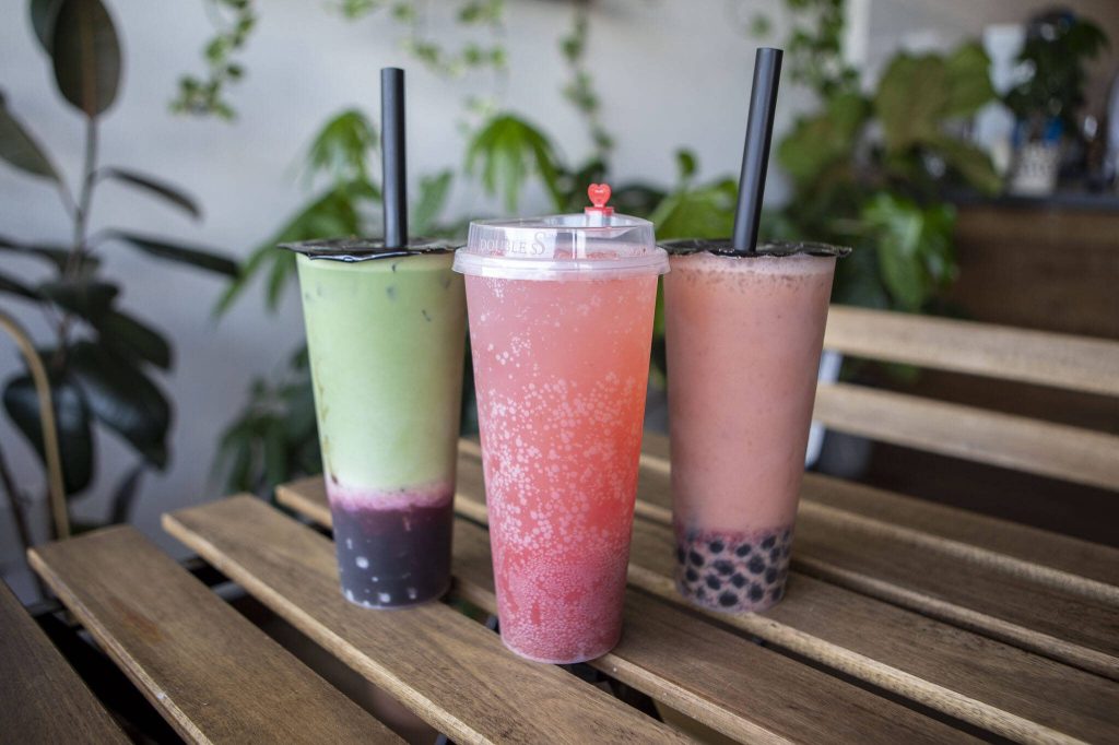 Left to right, matcha strawberry milk tea, sparkling strawberry yuzu, and strawberry Assam at Tobis Tea in Lynnwood, Washington on Tuesday, May 30, 2023. (Annie Barker / The Herald)