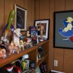 Small dog figurines, spaceships and a large painting of Rover are on display in Brian Bassets studio on Wednesday, June 7, 2023, in Edmonds, Washington. (Olivia Vanni / The Herald)