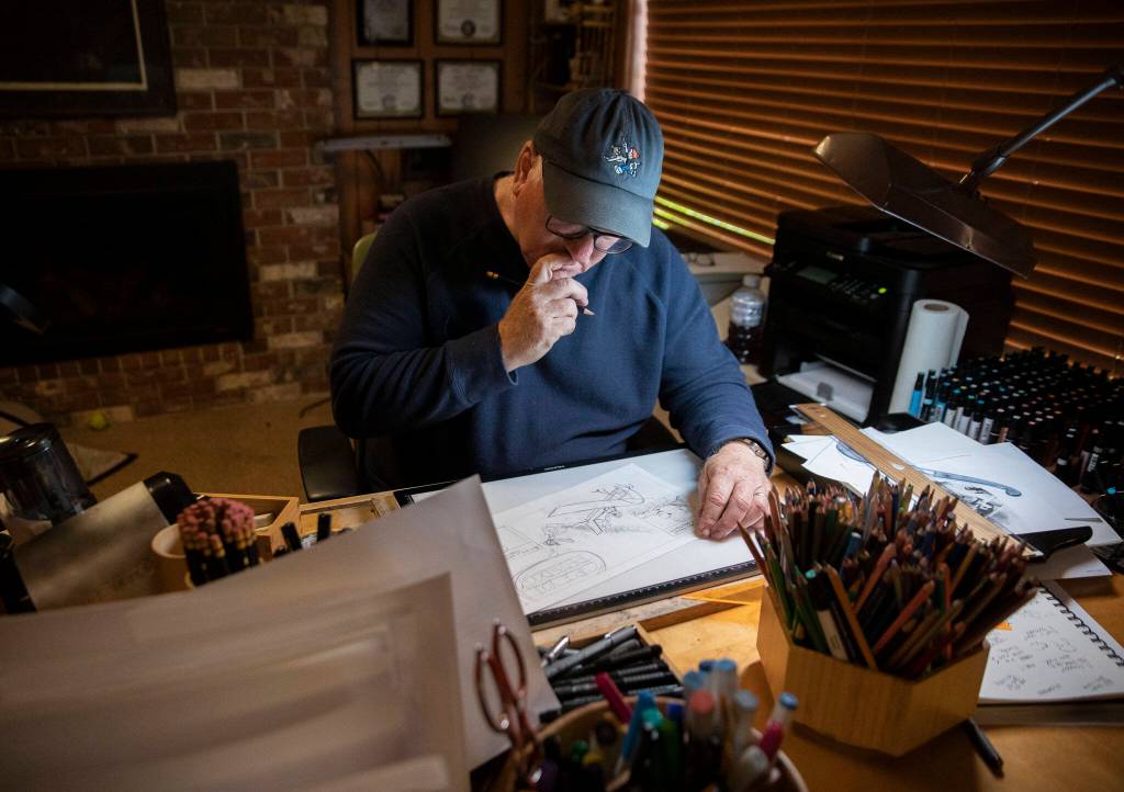 Brian Basset pauses while working on an upcoming Sunday comic in his studio on Wednesday, June 7, 2023, in Edmonds, Washington. (Olivia Vanni / The Herald)