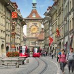Bernâ€™s famous clock tower, part of the original wall around the city, looms at the head of Marktgasse street.