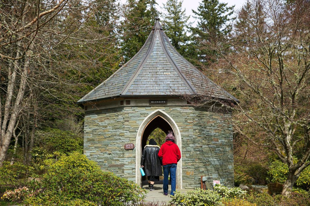 Two visitors enter Meerkerk Gardens on Wednesday, April 5, 2023, in Greenbank, Washington. (Ryan Berry / The Herald)