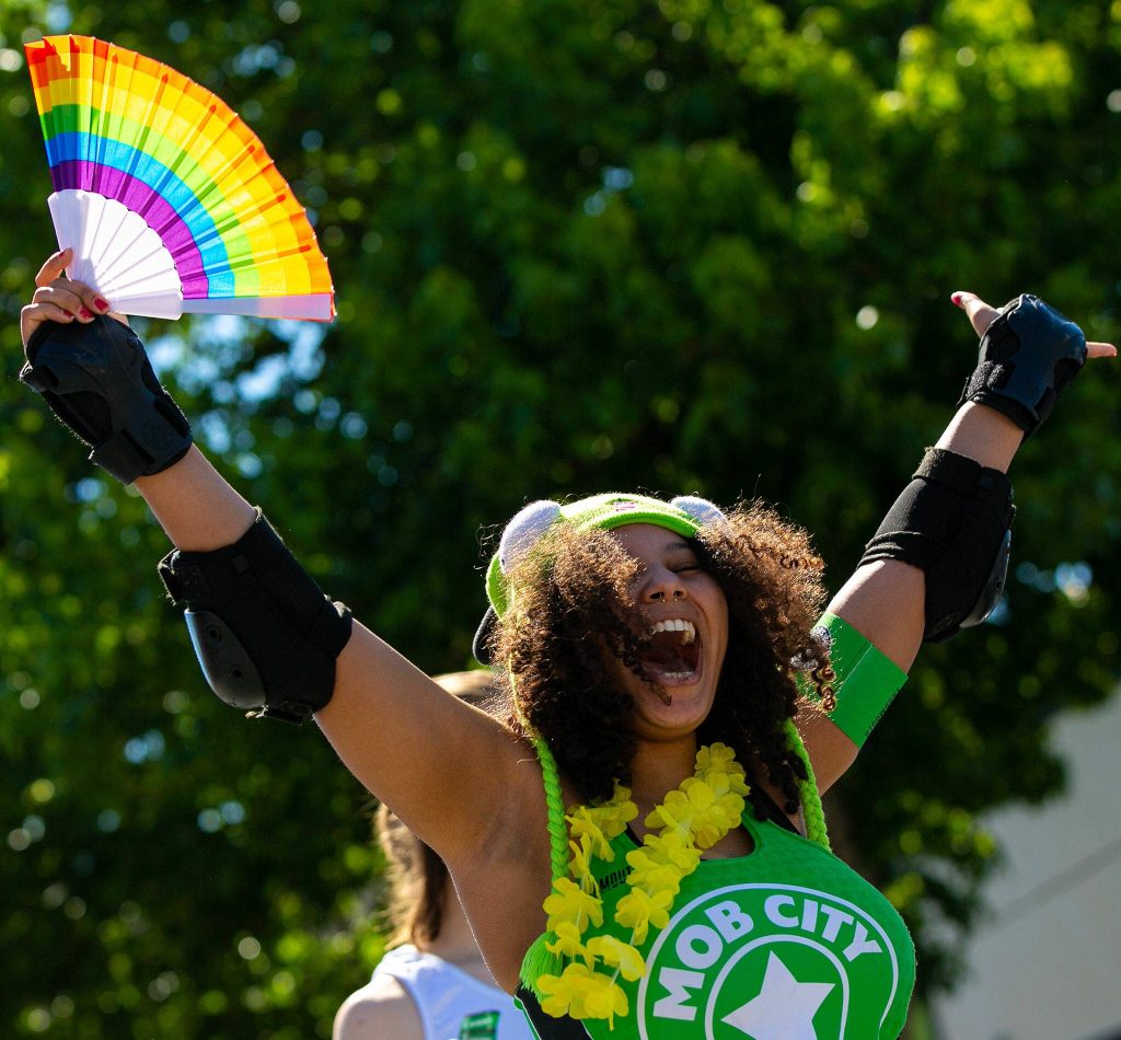 A skater from Mob City Junior Roller Derby wheels through the streets during Snohomishs inaugural Pride celebration on Saturday, June 3, 2023, in downtown Snohomish, Washington. (Ryan Berry / The Herald)