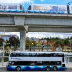 A Sound Transit bus at its new stop in the shadow of the newly opened Northgate Lightrail Station in Seattle. (Kevin Clark / The Herald)