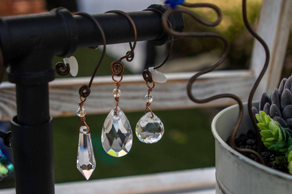 Items crafted by Amanda Sarah Metals at the Everett Farmers Market across from the Everett Station in Everett, Washington on Wednesday, June 14, 2023. (Annie Barker / The Herald)
