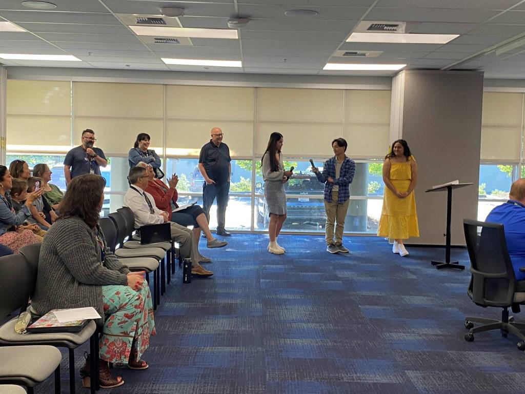 Winners discuss their accomplishments with the school board and district staff. (Photo credit Monroe School District)