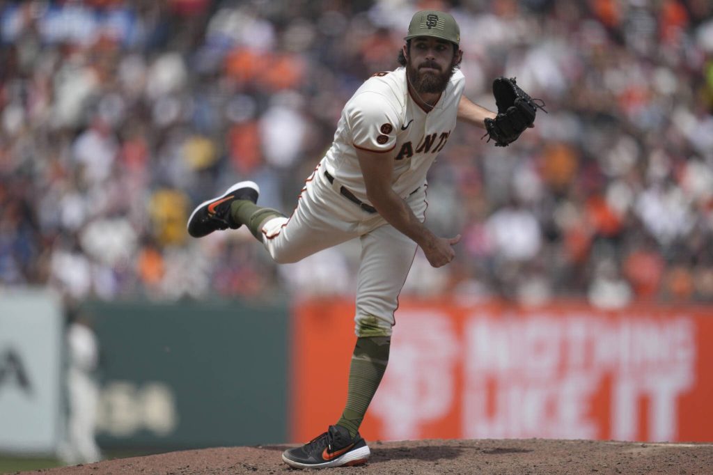 Giants pitcher Ryan Walker throws during a game against the Marlins on May 21 in San Francisco. (AP Photo/Jeff Chiu)