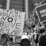 Rebecca Blackwell / Associated Press
People rally outside the Wilkie D. Ferguson Jr. U.S. Courthouse, Tuesday, in Miami. Former President Donald Trump appeared in federal court Tuesday on dozens of felony charges accusing him of illegally hoarding classified documents and thwarting the Justice Departments efforts to get the records back.