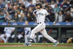 Seattle Mariners' Jose Caballero takes a swing during an at-bat in a baseball game against the Miami Marlins, Tuesday, June 13, 2023, in Seattle. The Mariners won 9-3. (AP Photo/Stephen Brashear)