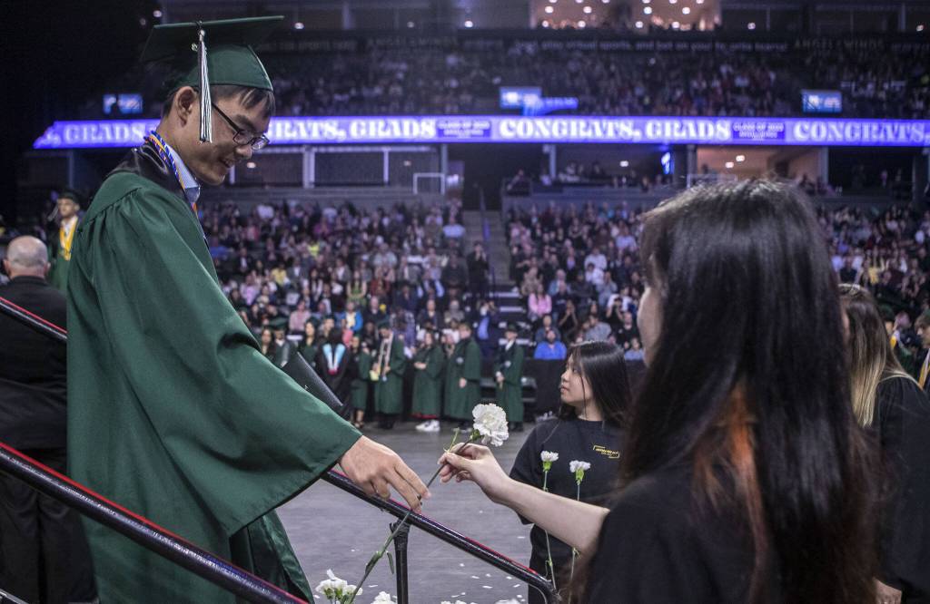 Scenes from the Jackson High School graduation ceremony at Angel of the Winds in Everett, Washington on Saturday, June 17, 2023. (Annie Barker / The Herald)