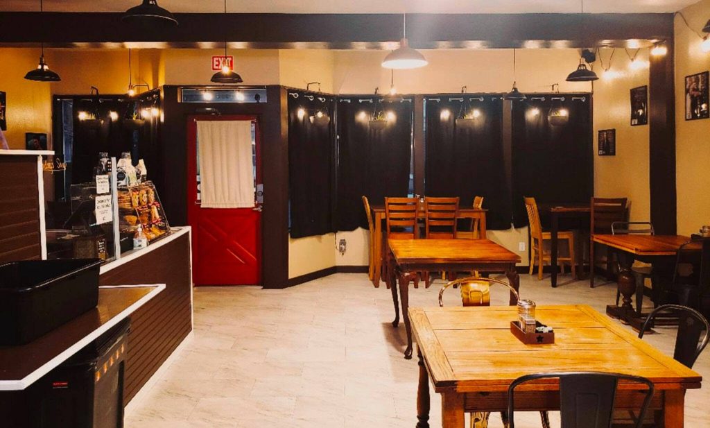 Catalyst Cafes first location at 1513 23rd St., now closed, could comfortably accommodate only about 25 people. The warm, wood-paneled space hosted sober karaoke nights and drag performances as well as a sprawling community board and artwork by friends and regulars. With the move to a larger space on Hewitt, owner Adair Gearhart plans to expand their menu offerings and provide more resources for Everetts queer community. (Adair Gearhart)