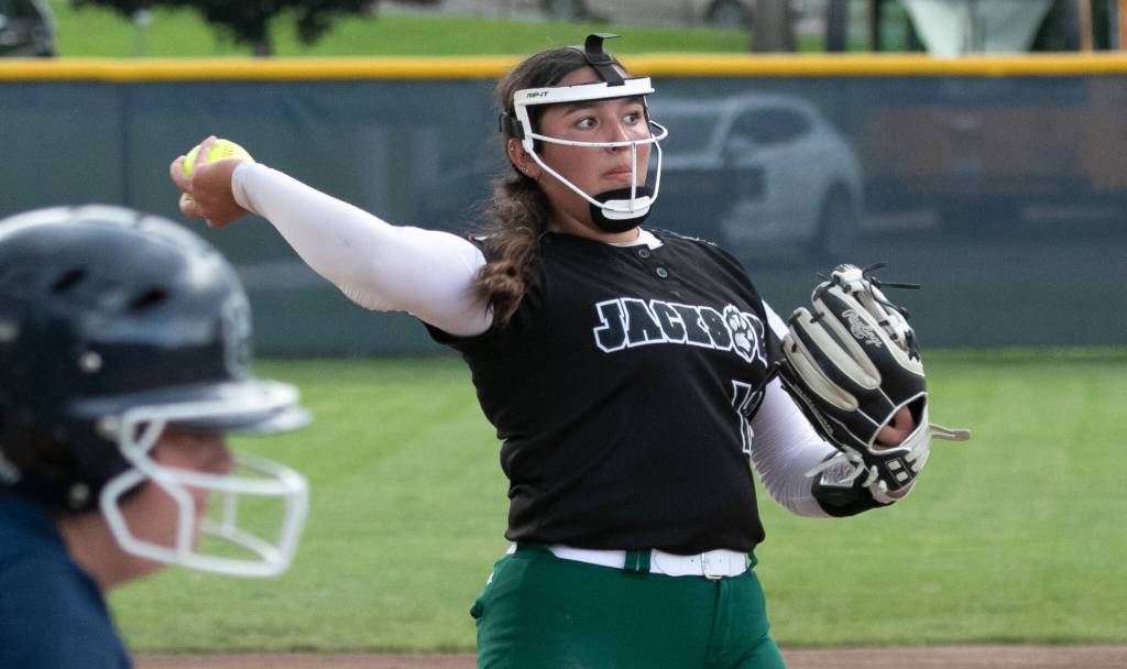 Jackson High School’s Yanina Sherwood (13), throws the ball to first base for an out during the WIAA class 4A state softball title game on Sat., May 27, 2023 in Richland, Wash. (TJ Mullinax/for The Herald)
