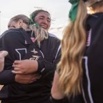 Jackson’s Yanina Sherwood cries while hugging catcher and teammate Leneyah Mitchell after beating Bothell to become the 3A district champions on Friday, May 19, 2023 in Everett, Washington. (Olivia Vanni / The Herald)