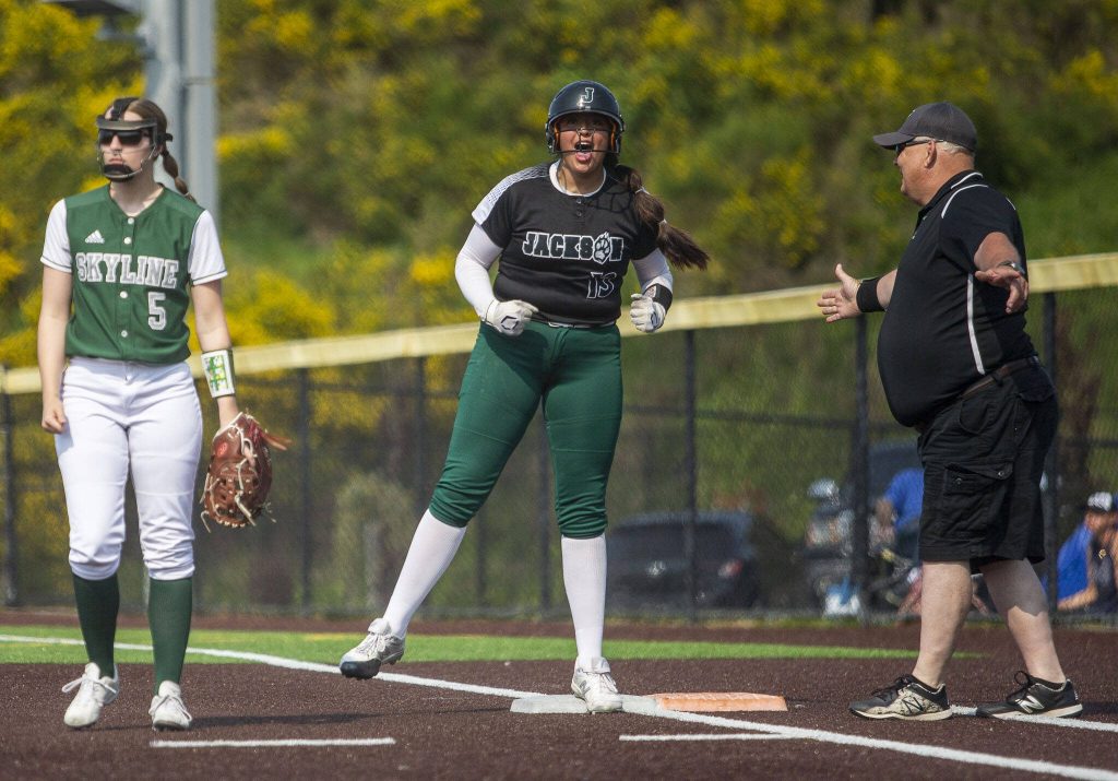 Jackson’s Yanina Sherwood yells after getting a hit during the game against Skyline on Wednesday, May 17, 2023 in Everett, Washington. (Olivia Vanni / The Herald)