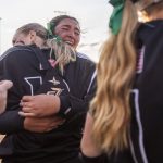 Jackson’s Yanina Sherwood cries while hugging catcher and teammate Leneyah Mitchell after beating Bothell to become the 3A district champions on Friday, May 19, 2023 in Everett, Washington. (Olivia Vanni / The Herald)