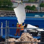 Debris from the Titan submersible, recovered from the ocean floor near the wreck of the Titanic, is unloaded from the ship Horizon Arctic at the Canadian Coast Guard pier in St. Johns, Newfoundland, Wednesday, June 28, 2023. (Paul Daly/The Canadian Press via AP)
