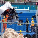 Debris from the Titan submersible, recovered from the ocean floor near the wreck of the Titanic, is unloaded from the ship Horizon Arctic at the Canadian Coast Guard pier in St. Johns, Newfoundland, Wednesday, June 28, 2023. (Paul Daly/The Canadian Press via AP)