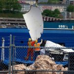 Debris from the Titan submersible, recovered from the ocean floor near the wreck of the Titanic, is unloaded from the ship Horizon Arctic at the Canadian Coast Guard pier in St. John's, Newfoundland, Wednesday, June 28, 2023. (Paul Daly/The Canadian Press via AP)