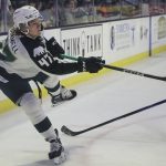 The Silvertips Kaden Hammell passes the puck during a game against the Blazers on Jan. 12 at the Angel of the Winds Arena in Everett. (Annie Barker / The Herald)