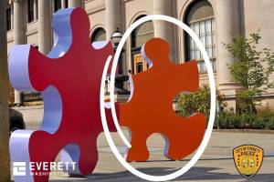 The orange puzzle piece from the sculpture “Playmates" in downtown Everett is missing. (Photo provided by the Everett Police Department)