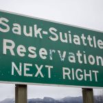 A sign near the Sauk-Suiattle Reservation in Darrington, Washington, on Thursday, March 23, 2023. (Annie Barker / The Herald)