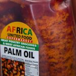 A large gallon jug of imported palm oil available at Dizayus African Market on Wednesday, June 21, 2023 in Everett, Washington. (Olivia Vanni / The Herald)