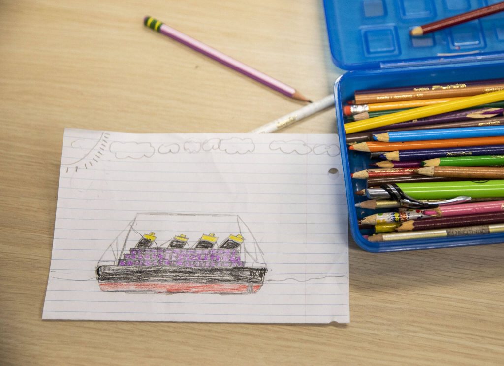A drawing is left on a table during tutoring. (Olivia Vanni / The Herald)