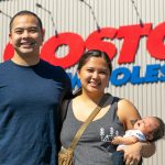 Angelo and Jona Sarmiento, along with 7-week-old Carlisle, stand in front of the Costco where Jona went into labor with the couple's first child in late May on Friday, July 14, 2023, in Lake Stevens, Washington. (Ryan Berry / The Herald)