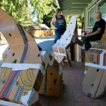 Unpainted vertebrae show their banana box origins. Volunteers have been responsible for constructing and painting the 24 vertebrae. (Ryan Berry / The Herald)