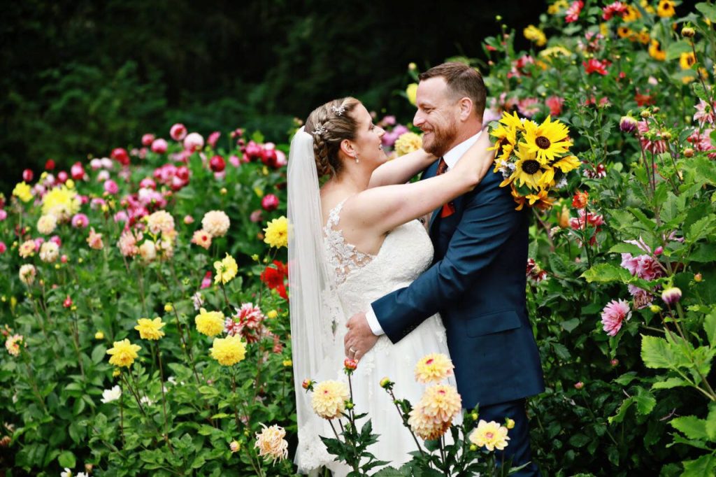Paul and Emily Grubb held the first wedding  their own  at Cascadia Meadows at the Little Brown Church in 2021. (Photo by Michael Stadler)